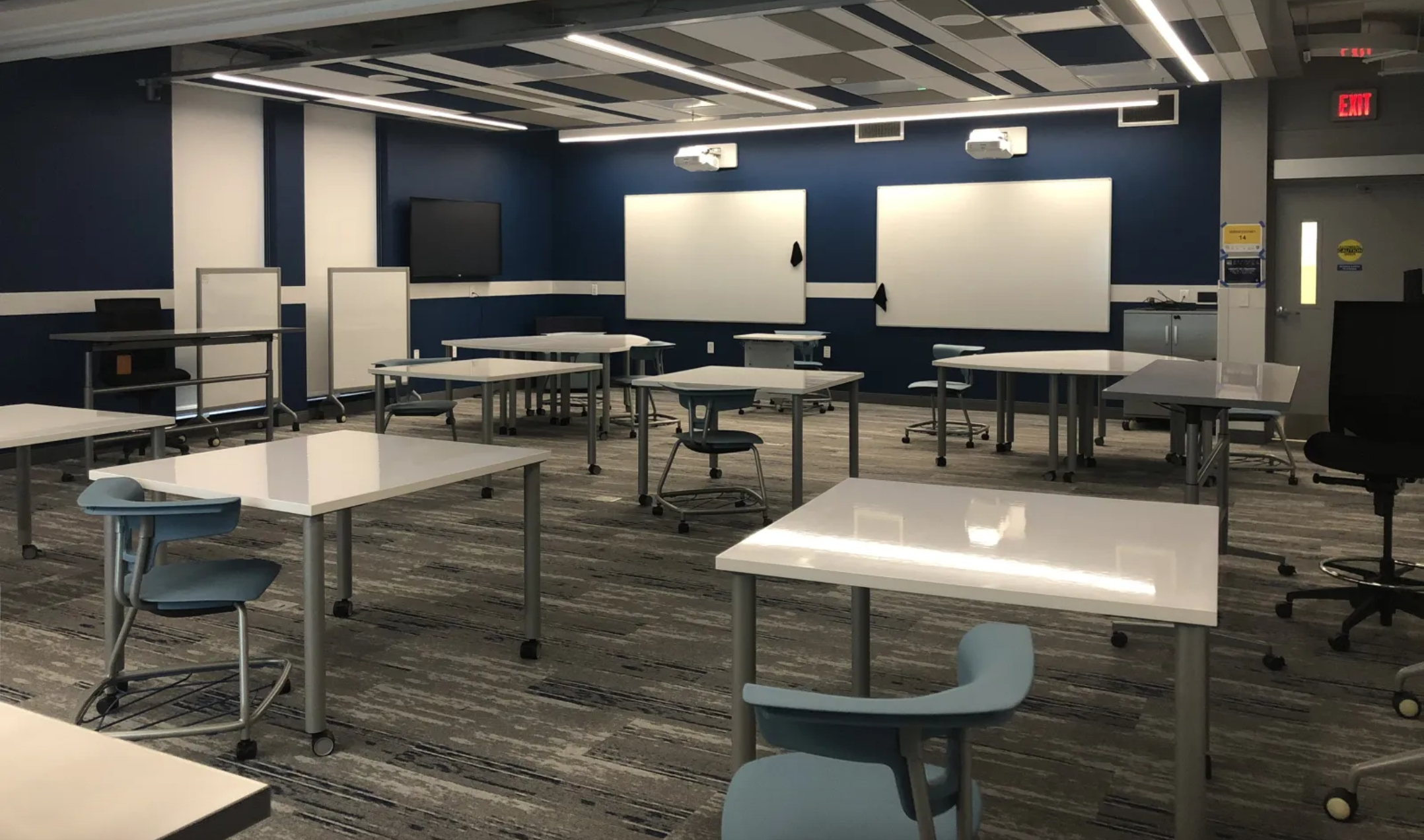 Beaver Library 001 classroom with multiple whiteboards and short throw projectors